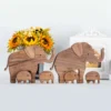 A mother elephant and two baby elephants_12 A Mother Elephant And Two Baby Elephants Wood Sculptures